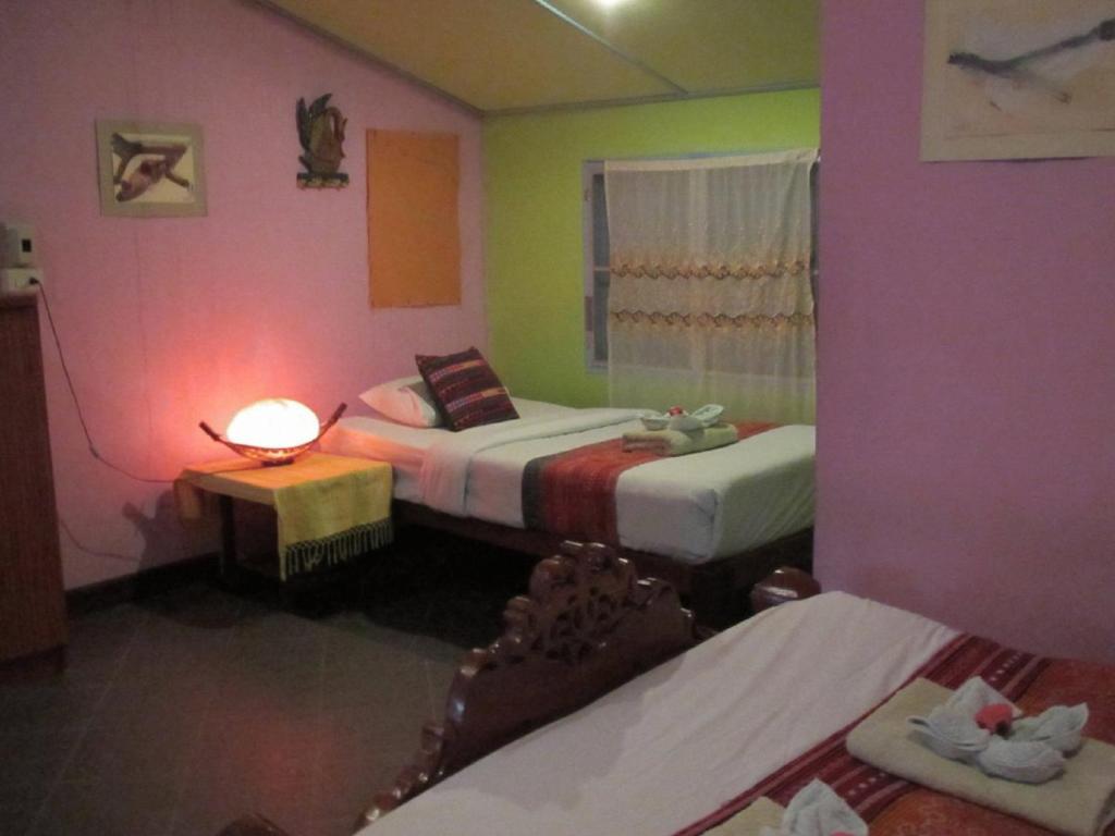 Orchid Hibiscus Guest House Sukhothai Rum bild
